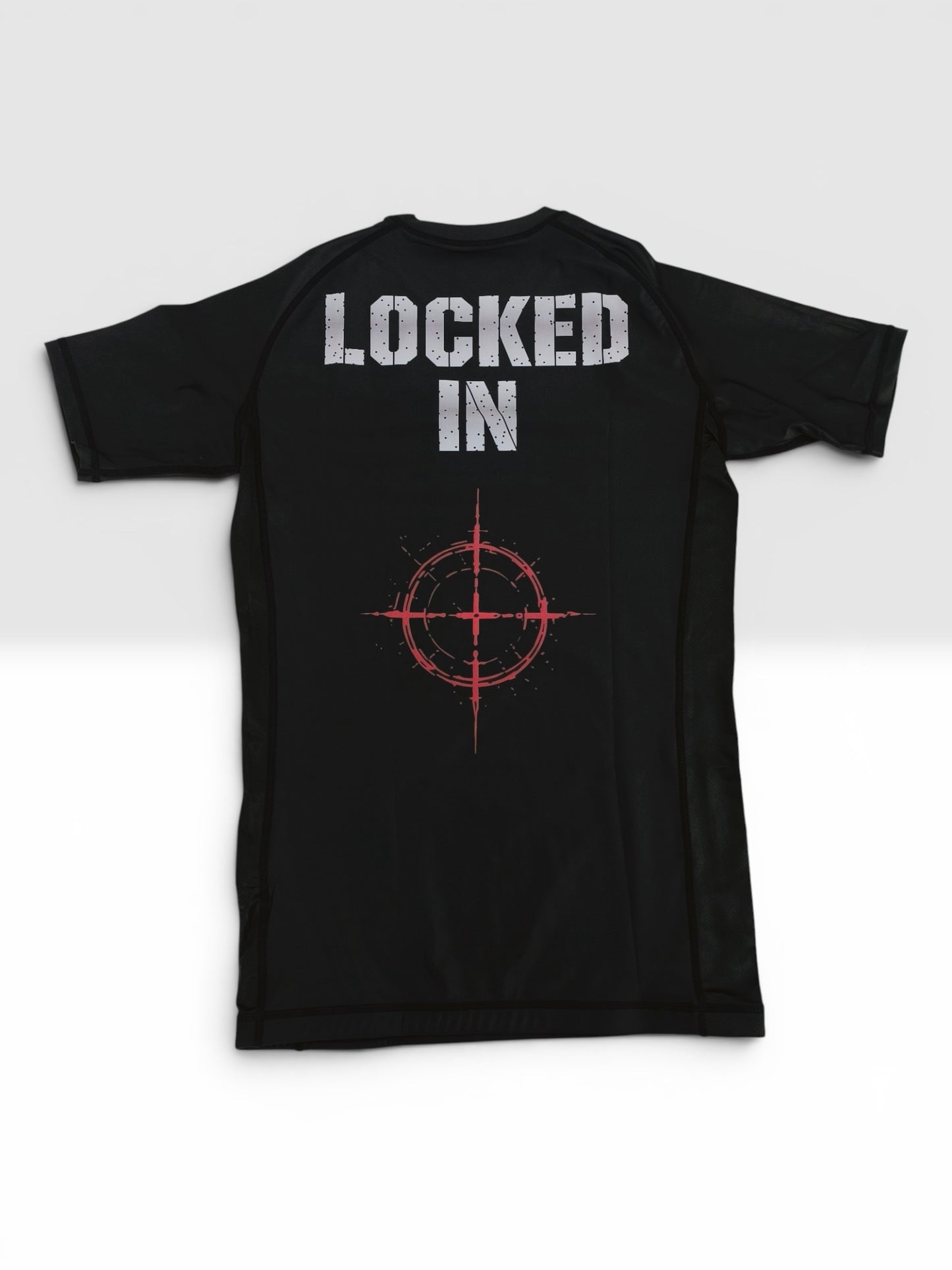 LOCKED IN RASH GUARD